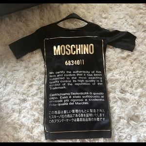 Woman beautiful woman size small moschino dress NWOT never been worn